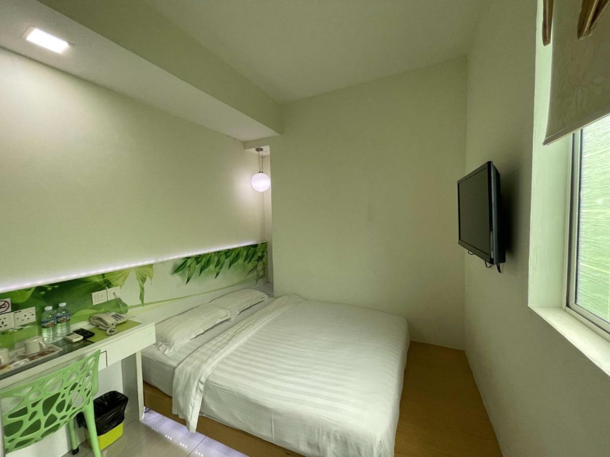 Green Apple Boutique Hotel Kota Kinabalu Bagian luar foto
