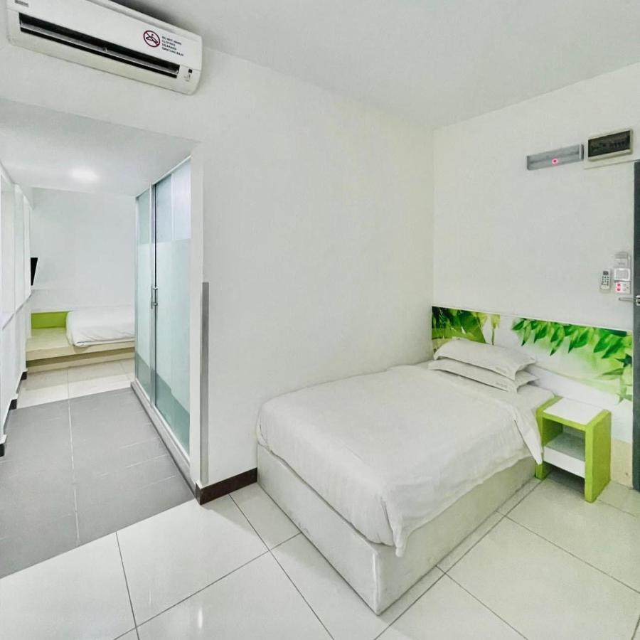 Green Apple Boutique Hotel Kota Kinabalu Bagian luar foto